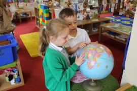 FS-Geography-Pupils-with-Globe